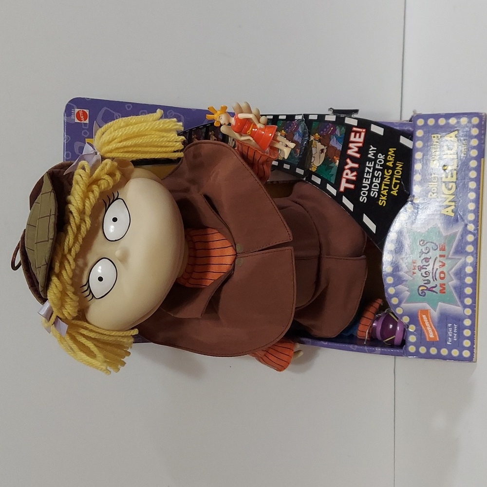 The Rugrats movie roller skating Angelica Pickels ages 4+ . Dated 1998 new .